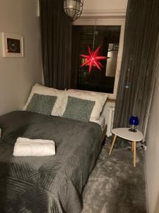 Posteľ alebo postele v izbe v ubytovaní Apartament Komorowskiego