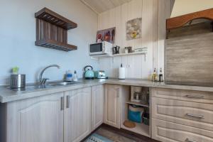 A kitchen or kitchenette at Las Hermanas A