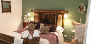 Ένα ή περισσότερα κρεβάτια σε δωμάτιο στο Attico MEA