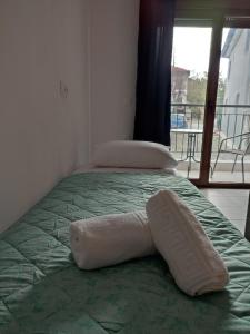 Postel nebo postele na pokoji v ubytování New Era