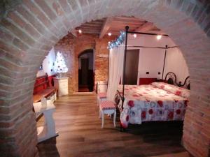 Agriturismo La Poderina客房内的一张或多张床位