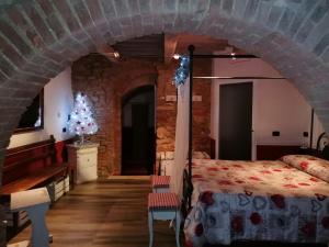 Agriturismo La Poderina客房内的一张或多张床位