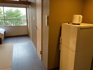 เตียงในห้องที่ Koya TRIBE - Vacation STAY 83089v