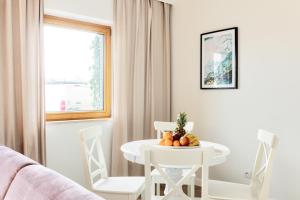 Posedenie v ubytovaní Apartament Nadmotławski Sen