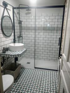 a bathroom with a shower and a sink at La Costera en Liérganes, Cabarceno in Liérganes +11 photos