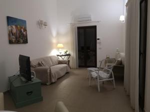 TV a/nebo společenská místnost v ubytování Villa Residenza Medea
