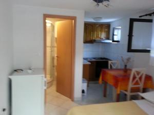 Kuchyň nebo kuchyňský kout v ubytování Apartment Marija