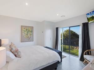 Ένα ή περισσότερα κρεβάτια σε δωμάτιο στο Noble House +19 φωτογραφίες