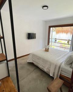 Ένα ή περισσότερα κρεβάτια σε δωμάτιο στο Casa Malva