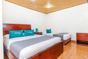 Krevet ili kreveti u jedinici u okviru objekta Hotel Nabusimake Modelia