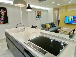 TV in/ali zabaviščno središče v nastanitvi Villa Monica