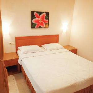 Hotel Flamboyan 객실 침대
