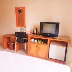 Hotel Flamboyan TV 또는 엔터테인먼트 센터