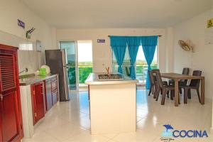 Η κουζίνα ή μικρή κουζίνα στο Hotel Sueños Libres Necoclí +34 φωτογραφίες