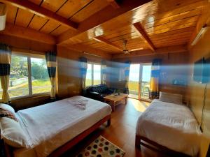 Ліжко або ліжка в номері Hotel waterside