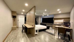 Voodi või voodid majutusasutuse KTK Pattaya Hotel & Residence toas
