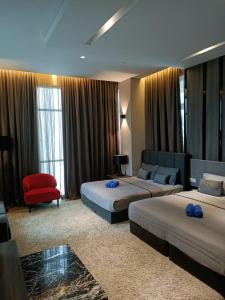 Postel nebo postele na pokoji v ubytování MARITIME SUITE KARPAH SINGH DRIVE PENANG