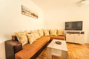 Svetainės erdvė apgyvendinimo įstaigoje Budva Garden Apartments