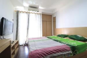 Apartment Paragon Village by Tere Roomにあるベッド +21枚の写真