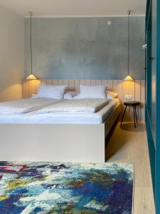 Łóżko lub łóżka w pokoju w obiekcie Appartements Steiner - SKI IN - SKI OUT