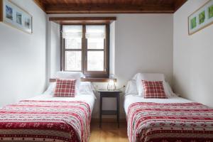 Postel nebo postele na pokoji v ubytování Val de Ruda Luxe 66 by FeelFree Rentals