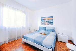 Posteľ alebo postele v izbe v ubytovaní Silent Apartment by Wonderful Italy + 7 fotografií