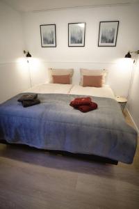 Ein Bett oder Betten in einem Zimmer der Unterkunft Ferienwohnung Eschenberg