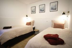 Ein Bett oder Betten in einem Zimmer der Unterkunft Ferienwohnung Eschenberg
