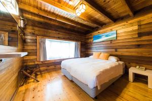 Postel nebo postele na pokoji v ubytování Kentington Resort
