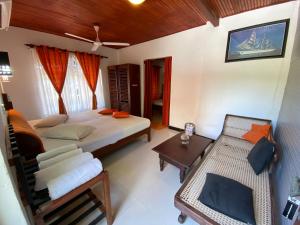 Postel nebo postele na pokoji v ubytování Beach Walk Hotel Unawatuna