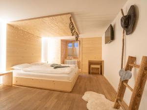 Postel nebo postele na pokoji v ubytování Hotel Wasserfall