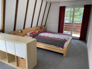 Postel nebo postele na pokoji v ubytování Ferienhaus Relax