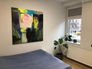 Postel nebo postele na pokoji v ubytování Happy Kaunas