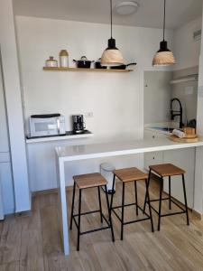 Kuchyň nebo kuchyňský kout v ubytování Paulista Flat Hotel