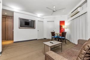 Télévision ou salle de divertissement dans l'établissement Novotel Darwin CBD