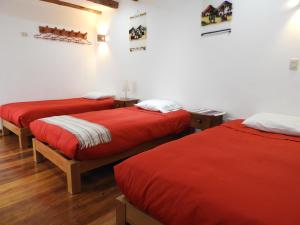Voodi või voodid majutusasutuse Picaflor Tambo Guest House toas