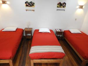 Voodi või voodid majutusasutuse Picaflor Tambo Guest House toas