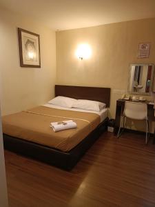 Postel nebo postele na pokoji v ubytování SO Hotel