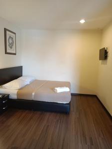 Postel nebo postele na pokoji v ubytování SO Hotel