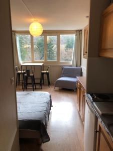 Kuchyň nebo kuchyňský kout v ubytování La Randonnée Résidence Le Bec de L'Aigle + 3 fotografie