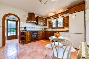 Kuchyň nebo kuchyňský kout v ubytování Villas Guzman - Petra