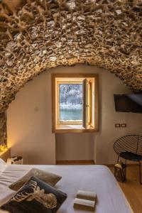 Postel nebo postele na pokoji v ubytování Bazzario B&B