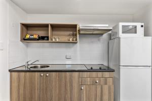 Cuisine ou kitchenette dans l'établissement Novotel Darwin CBD