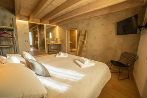 Postel nebo postele na pokoji v ubytování Bazzario B&B