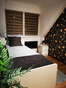 A bed or beds in a room at Pintes 38 A