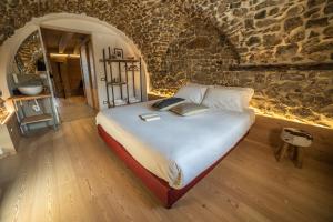 Postel nebo postele na pokoji v ubytování Bazzario B&B