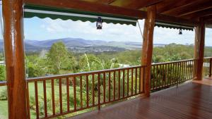 a porch with a view of the mountains at Atherton Blue Gum B&B in Atherton