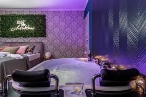 Łóżko lub łóżka w pokoju w obiekcie Exclusive Apartment Centrum 2