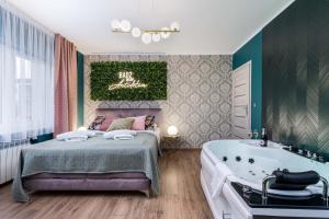 Łóżko lub łóżka w pokoju w obiekcie Exclusive Apartment Centrum 2