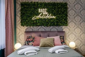 Łóżko lub łóżka w pokoju w obiekcie Exclusive Apartment Centrum 2
